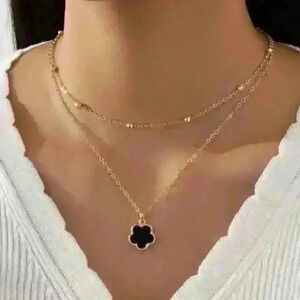Black Clover Layered Necklace on a delicate Gold Stainless Steel Chain